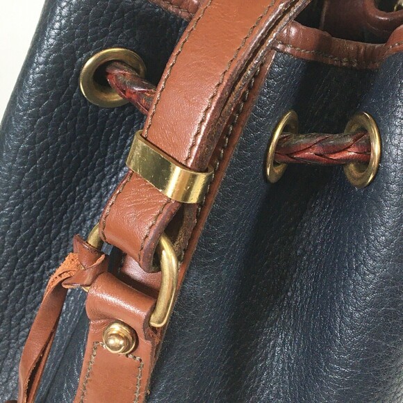 Dooney Bourke AWL Pebbled Leather Drawstring Hobo Bucket Navy Brown Shoulder Bag - Picture 4 of 16